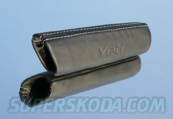 Škoda Yeti - Madlo ruční brzdy černé a bíle prošité s logem Yeti